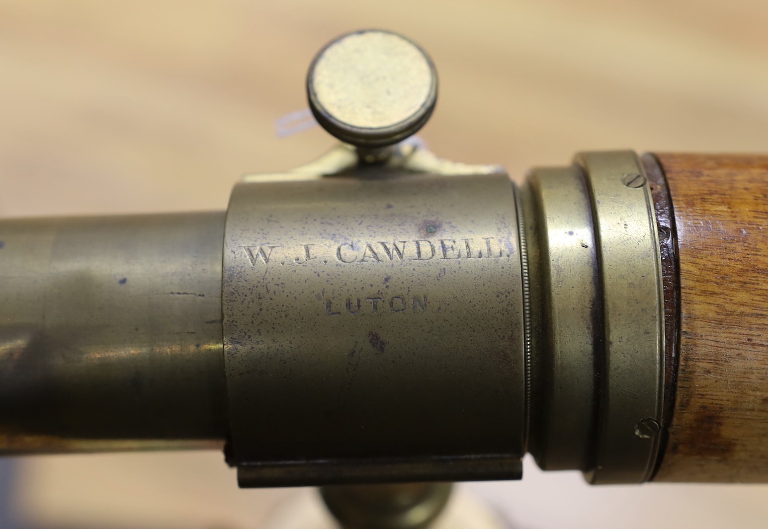 An Edwardian telescope on tripod, marked Cawdell, Luton, 107cm high